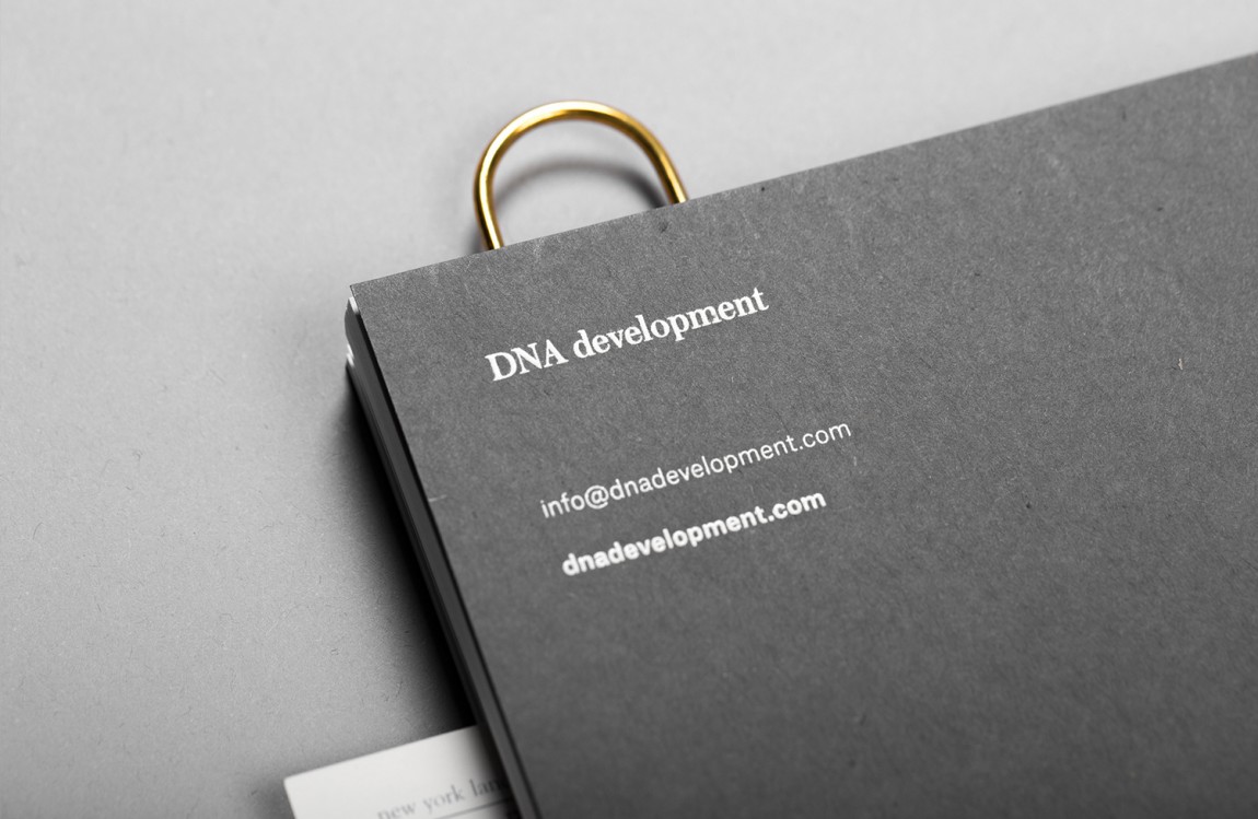  DNA Development 创意品牌logo设计：笔记本设计