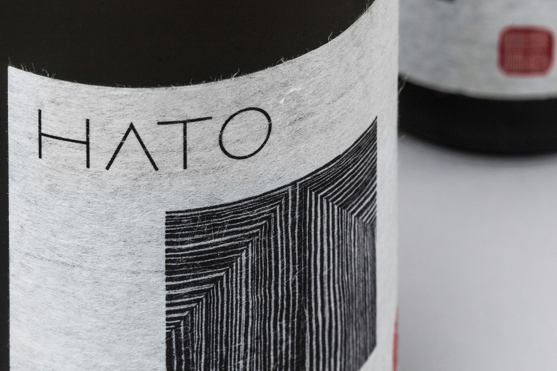 Brand identity and bottle labels for fine dining Asian restaurant Hato designed by Allink, Switzerland