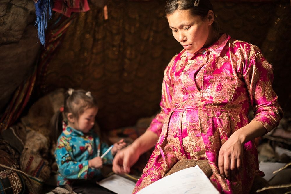 In the Nenets culture, all jobs inside the chum, including all of the house-keeping, cooking and taking care of the children and the dogs, are done by women, while men’s responsibilities are with the herd. Men are prohibited from doing any of the women’s work. Image credit: Alegra Ally/Schilt Publishing