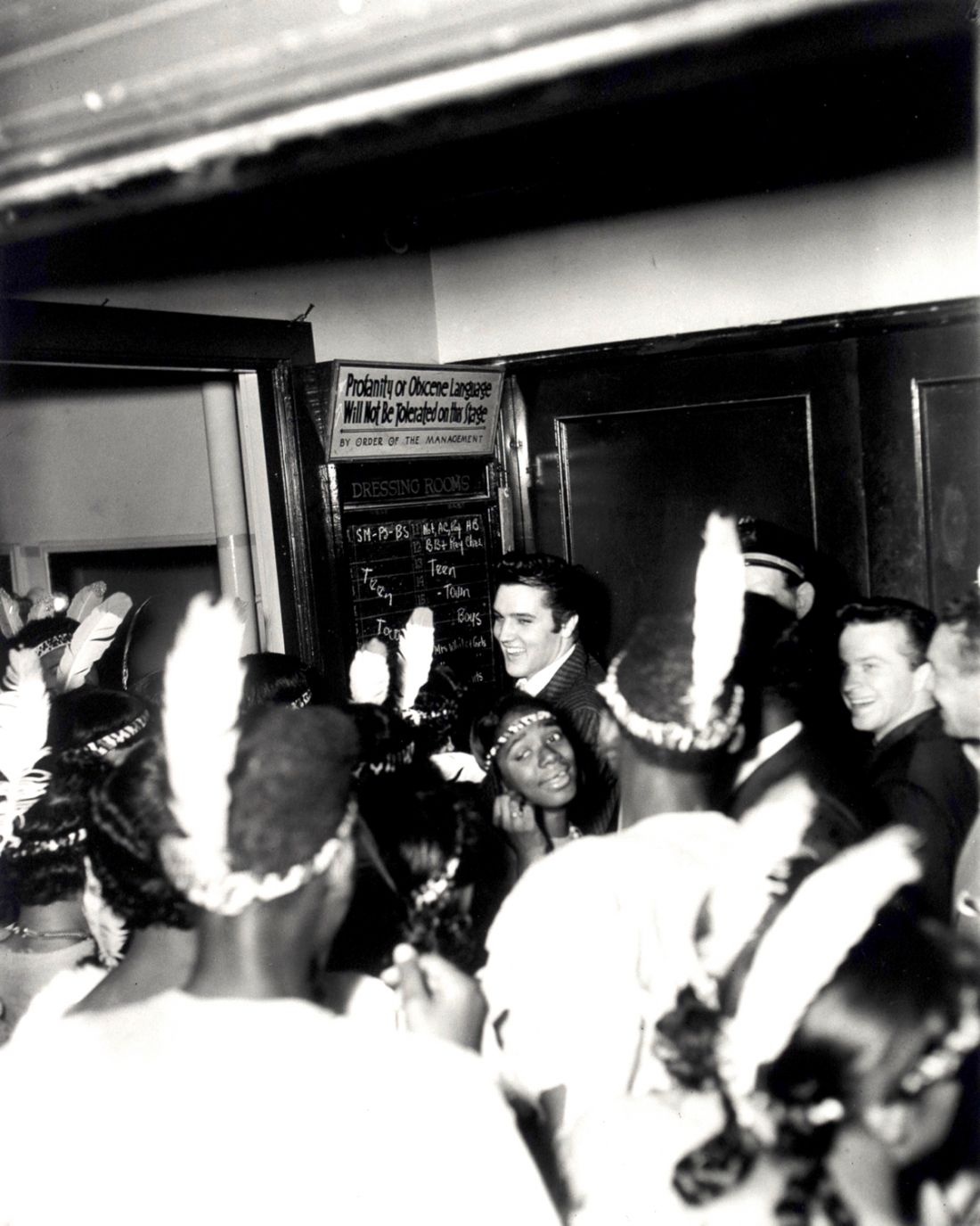 Elvis backstage, WDIA Goodwill Revue, Ellis Auditorium, December 7, 1956 (CarlaThomas in front) ? Estate of Ernest C Withers. Courtesy of Michael Hoppen Gallery
