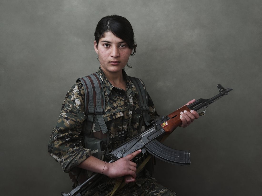 Portrait of Evrim S?engal, a volunteer fighter of the YJE?. Shengal Mountain, Nineveh Governorate, Iraq, March 12, 2015. From [We Came From Fire?](?https://amzn.to/2L9l8Vm) by Joey L. – published by powerHouse Books